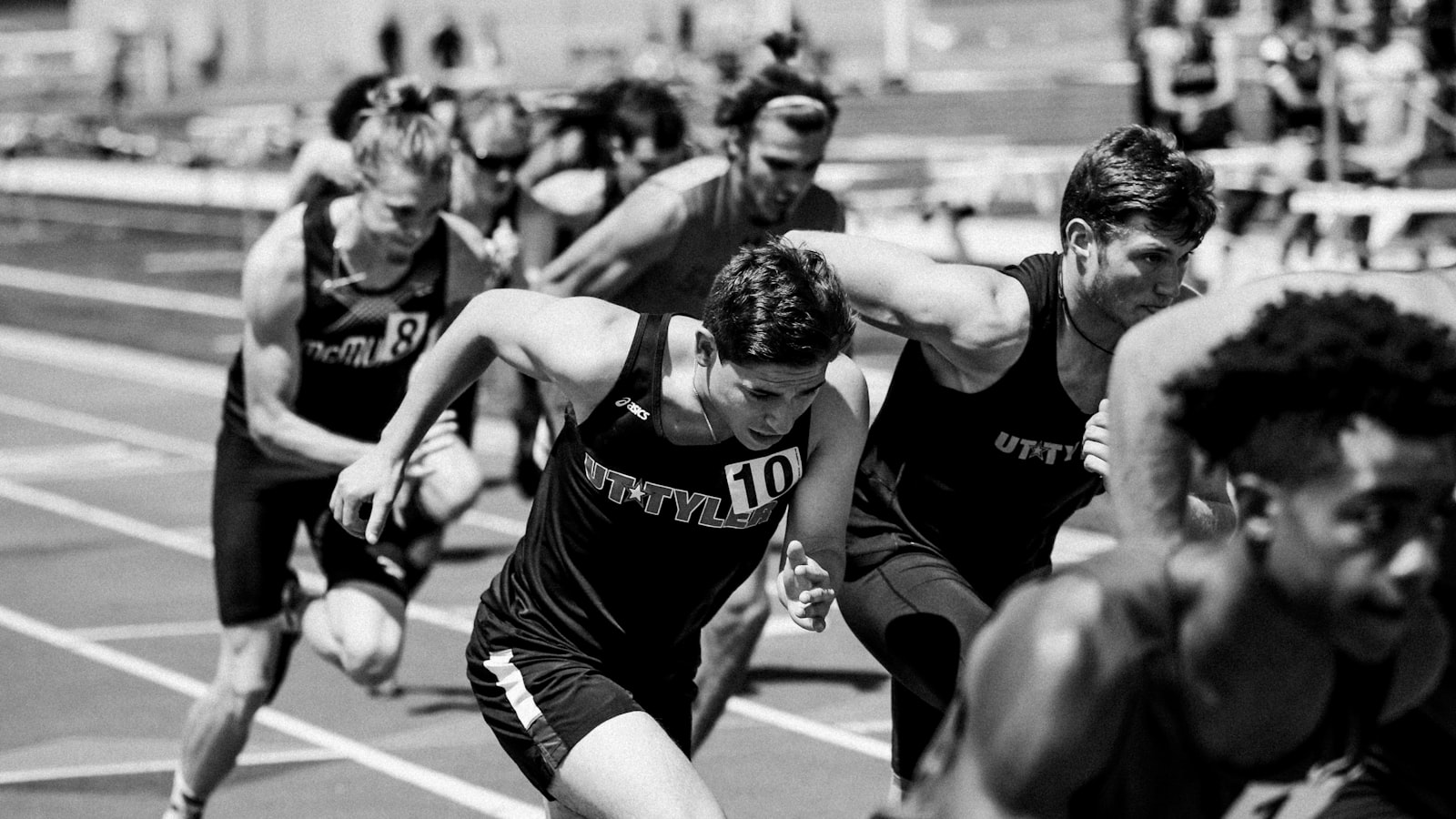 Runner striding on a track